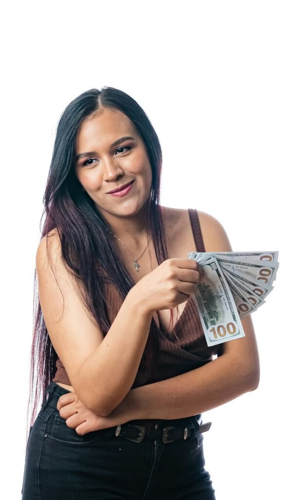 person excited by all the money she earned. happy girl for her earnings.